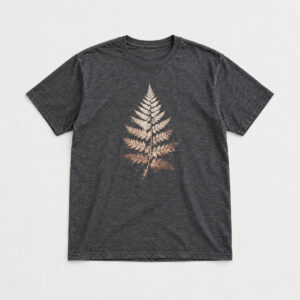 Bleach Fern Frond Tee with bleach-effect compact fern frond centred on the chest in off-white fading to faint rust