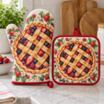 Berry Pie Oven Mitt and Pot Holder with a lattice-top berry pie with red berries and a cream border on both items