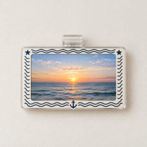 Moonlit Harbour Acrylic Photo Car Visor Clip with border of tiny waves, an anchor and two stars in navy and cream around a window showing an original sample photograph of a calm sea horizon at dawn