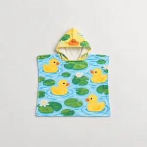 Little Duck Pond Kid Hooded Towel with all-over ducks, lily pads and ripples in yellow, blue and green with a small duck bill on the hood