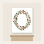 Oval Rose Wreath in Blush and Sage Canvas Print in white: An oval wreath of roses and leaves in blush and sage that leaves a quiet open space in the middle.