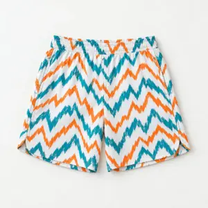 Zigzag Trail Sports Shorts with all-over zigzag trail lines in teal and orange on white