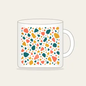 Coral, Teal and Mustard Terrazzo Pebbles Mug in white: All-over terrazzo pebbles in coral, teal and mustard on a cream ground with clear breathing room.